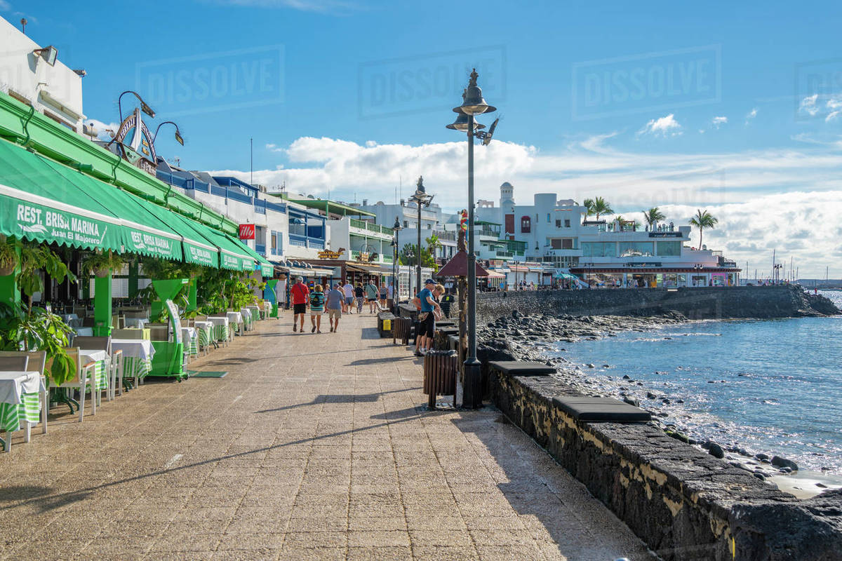 View of restaurants and shops overlooking Playa Blanca Beach, Playa