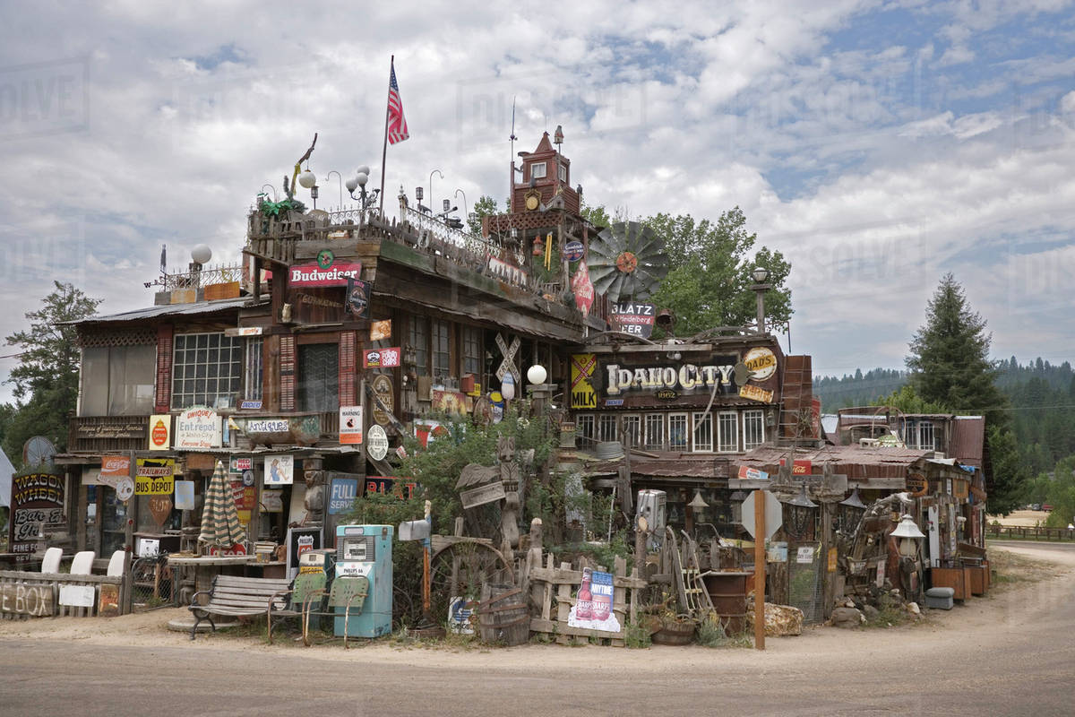 USA, Idaho, Idaho City. The Wagon Wheel Bar & Grill surrounded with old