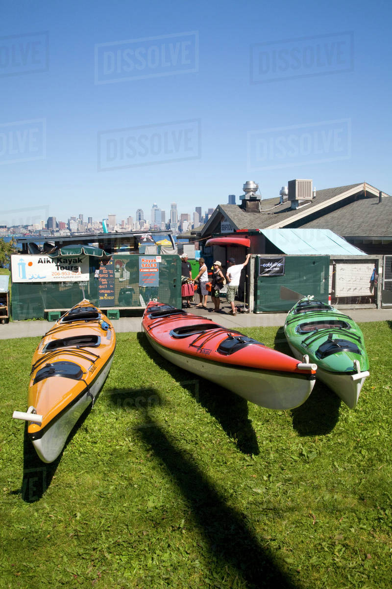 WA, Seattle, Kayaks for rent at Seacrest Park on Alki, Seattle skyline