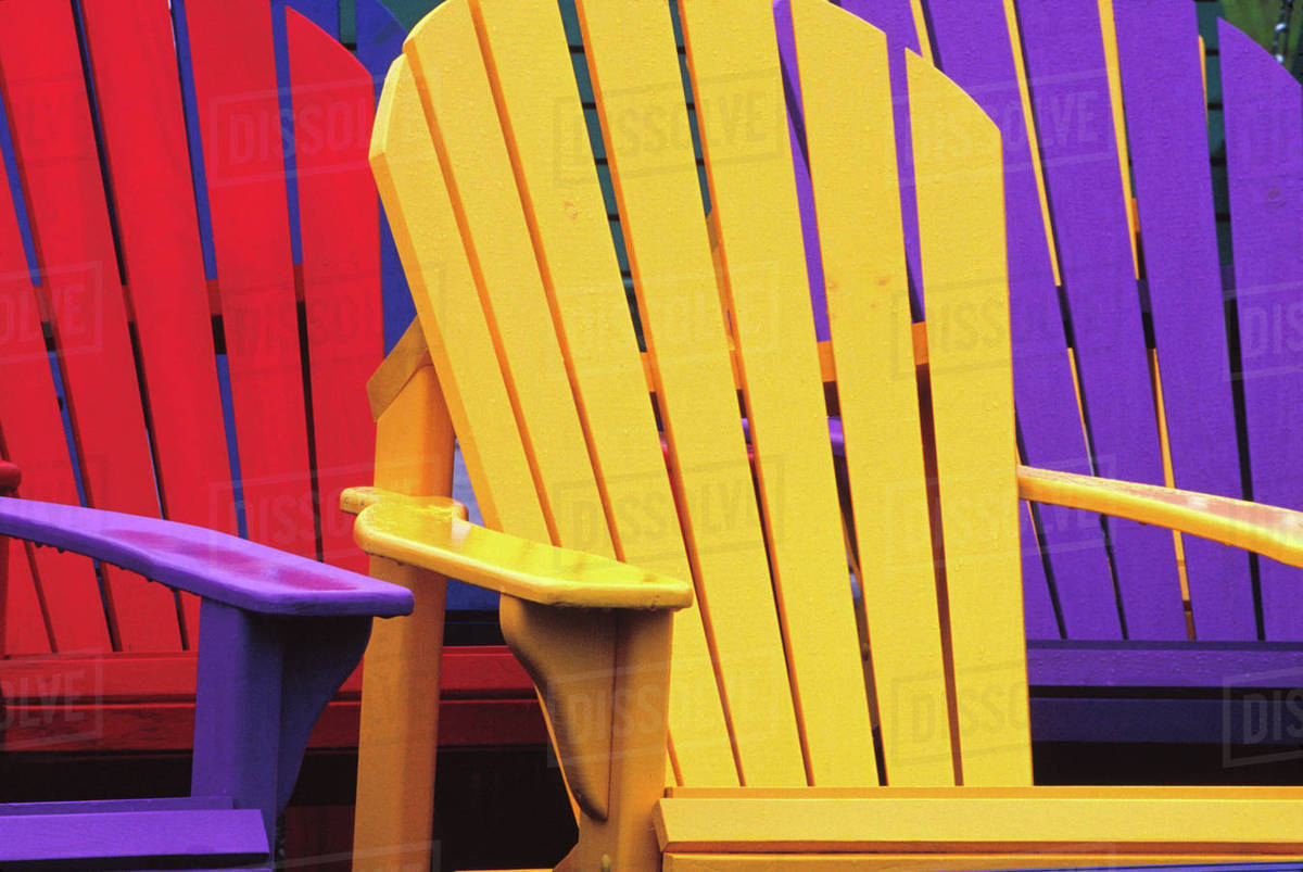 N.A. Canada, Nova Scotia, Bridgewater. Colorful adirondack chairs
