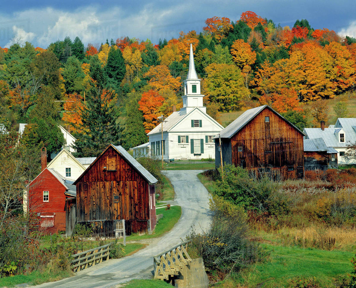 USA, Vermont, Waits River. Fall foliage adds further beauty to the