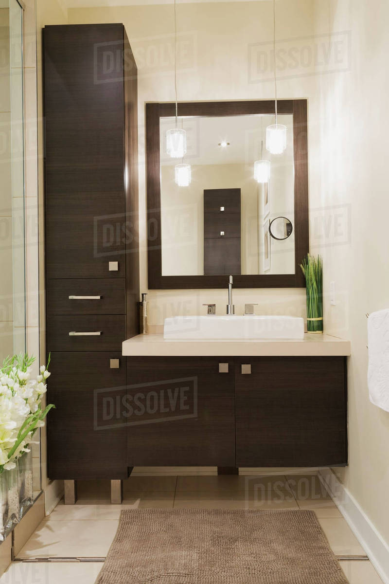 Contemporary Brown Laminated Wood Vanity With Mirror In Bathroom Of Contemporary Brown Laminated Wood Vanity With Mirror In Bathroom Of Renovated Ground Floor Apartment Old Residential Cottage Style Home