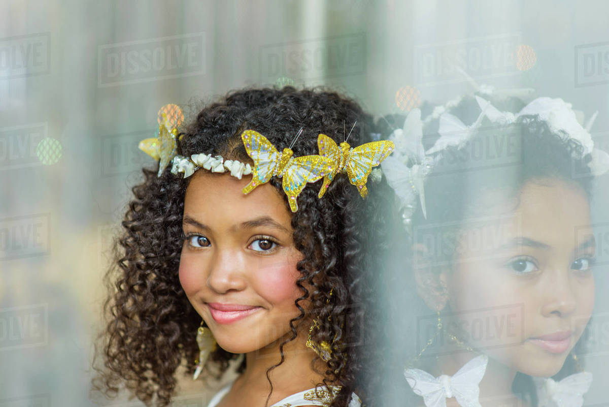 Portrait of two girls, wearing butterflies in hair Royalty-free stock photo