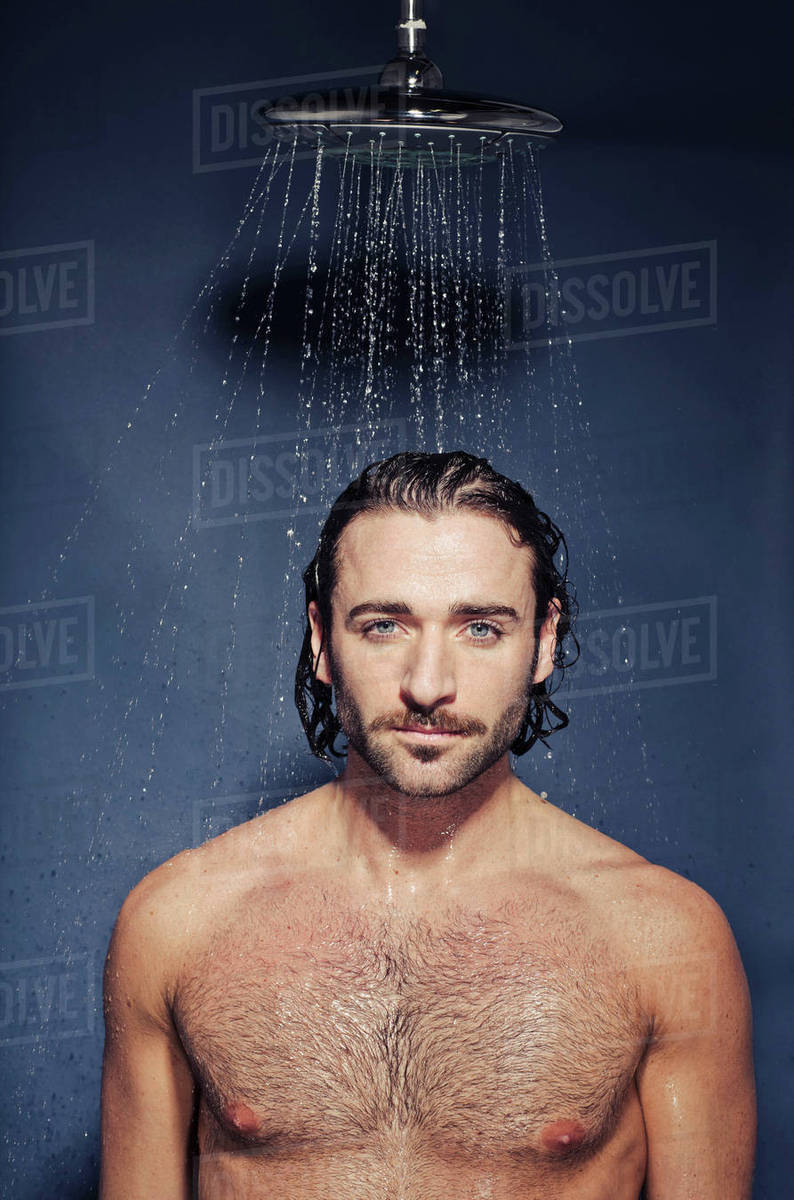 Portrait Of Young Man Under A Shower Stock Photo Dissolve