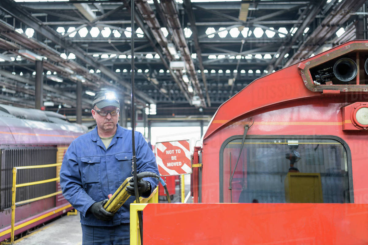 locomotive engineer working in train works stock photo dissolve locomotive engineer