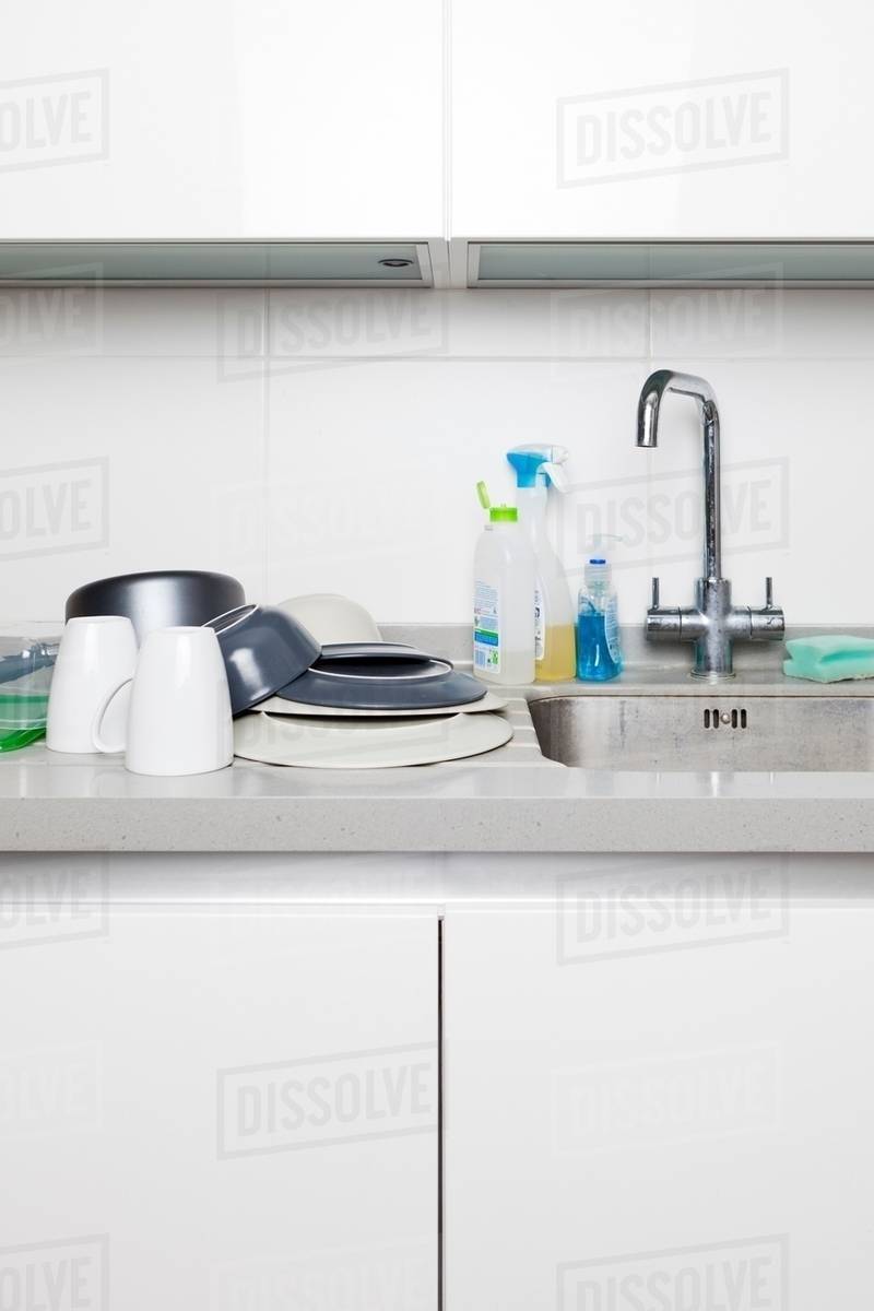 Washing up on kitchen sink Stock Photo Dissolve