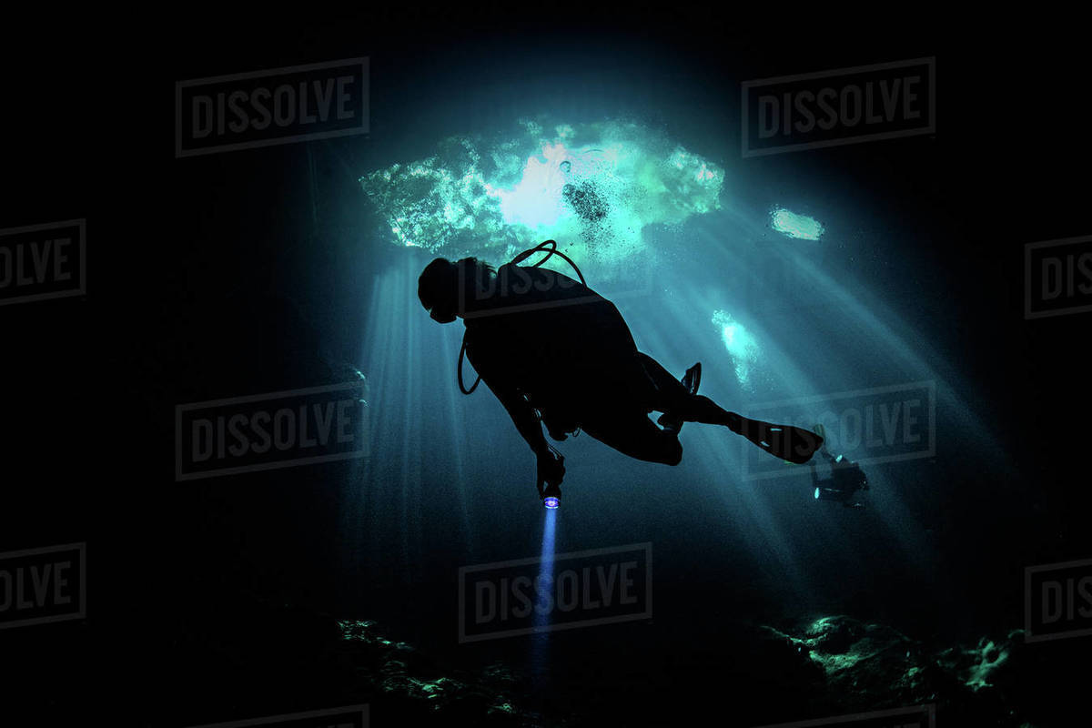 Cenote cave diving, Tulum, Quintana Roo, Mexico Stock Photo Dissolve