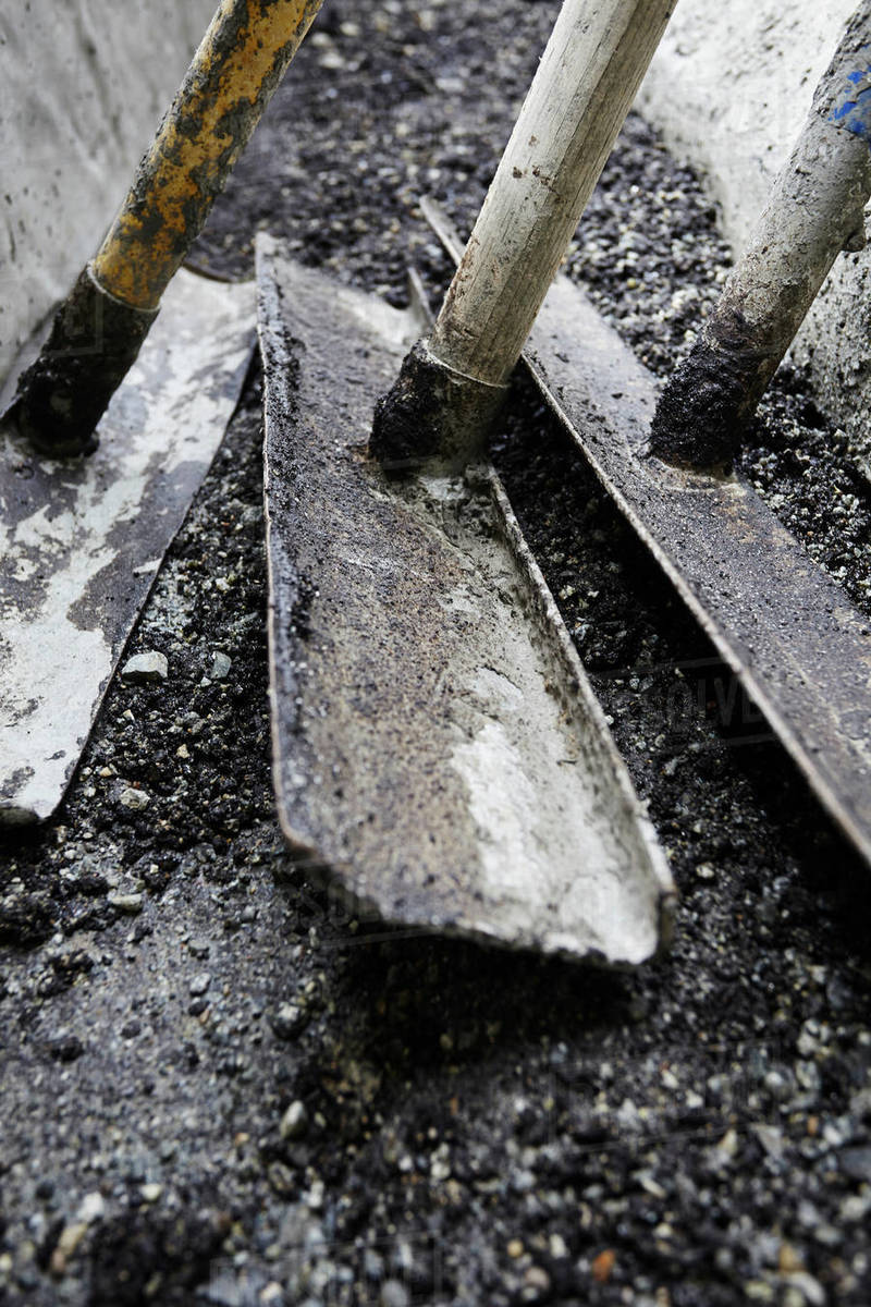 Asphalt lutes on highway construction site, close up detail Stock