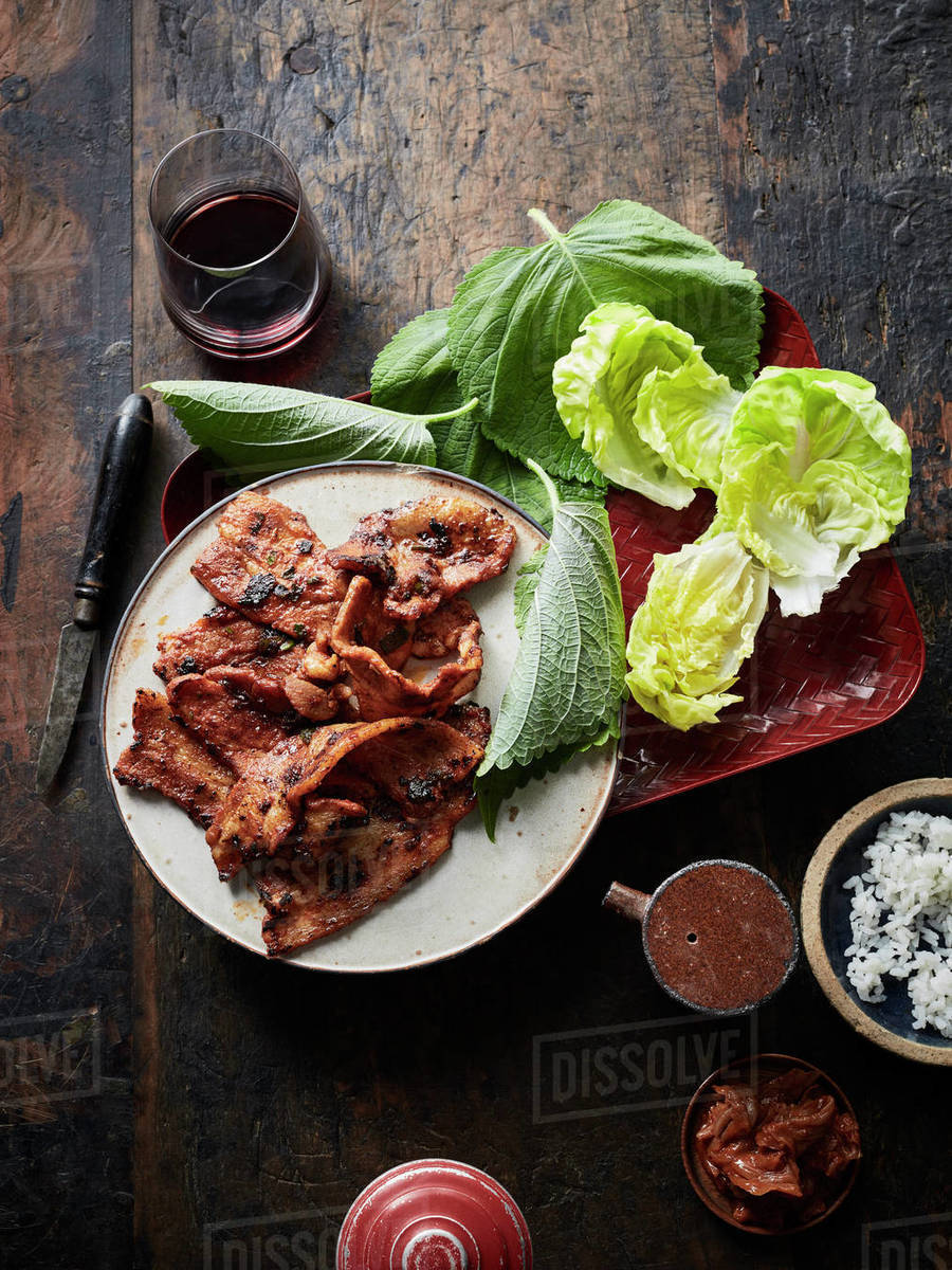 Daeji bulgogi (korean spicy pork) Stock Photo Dissolve