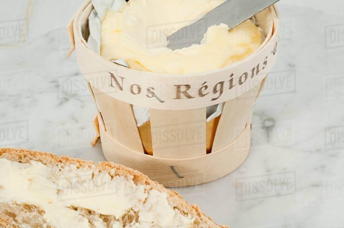 French butter and bread Stock Photo Dissolve