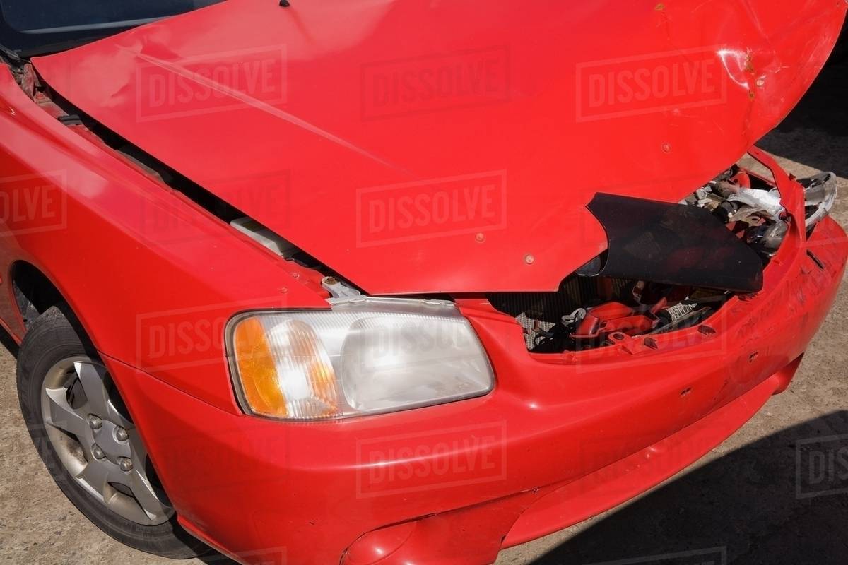 Smashed red car Stock Photo Dissolve