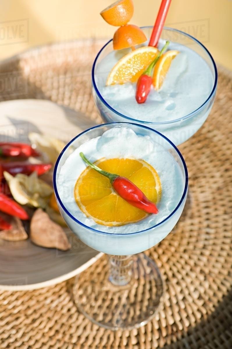 Cocktails with chilli peppers Stock Photo Dissolve