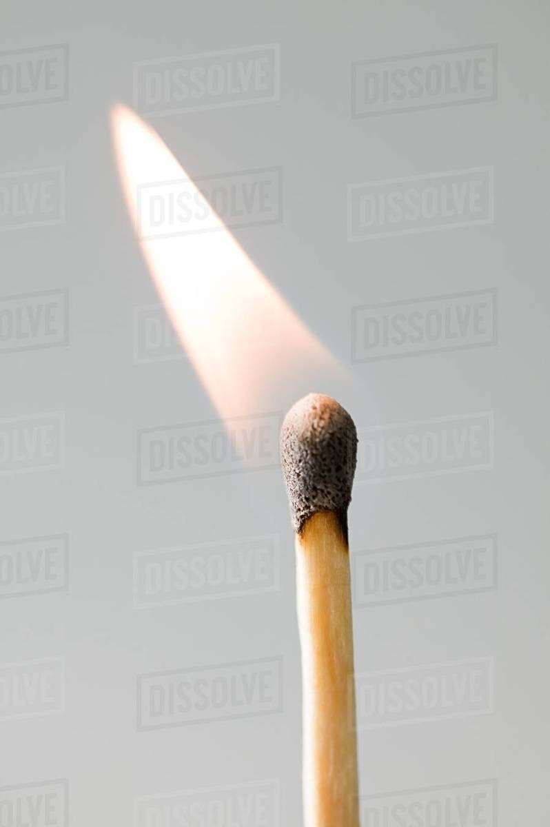 A burning match Stock Photo Dissolve