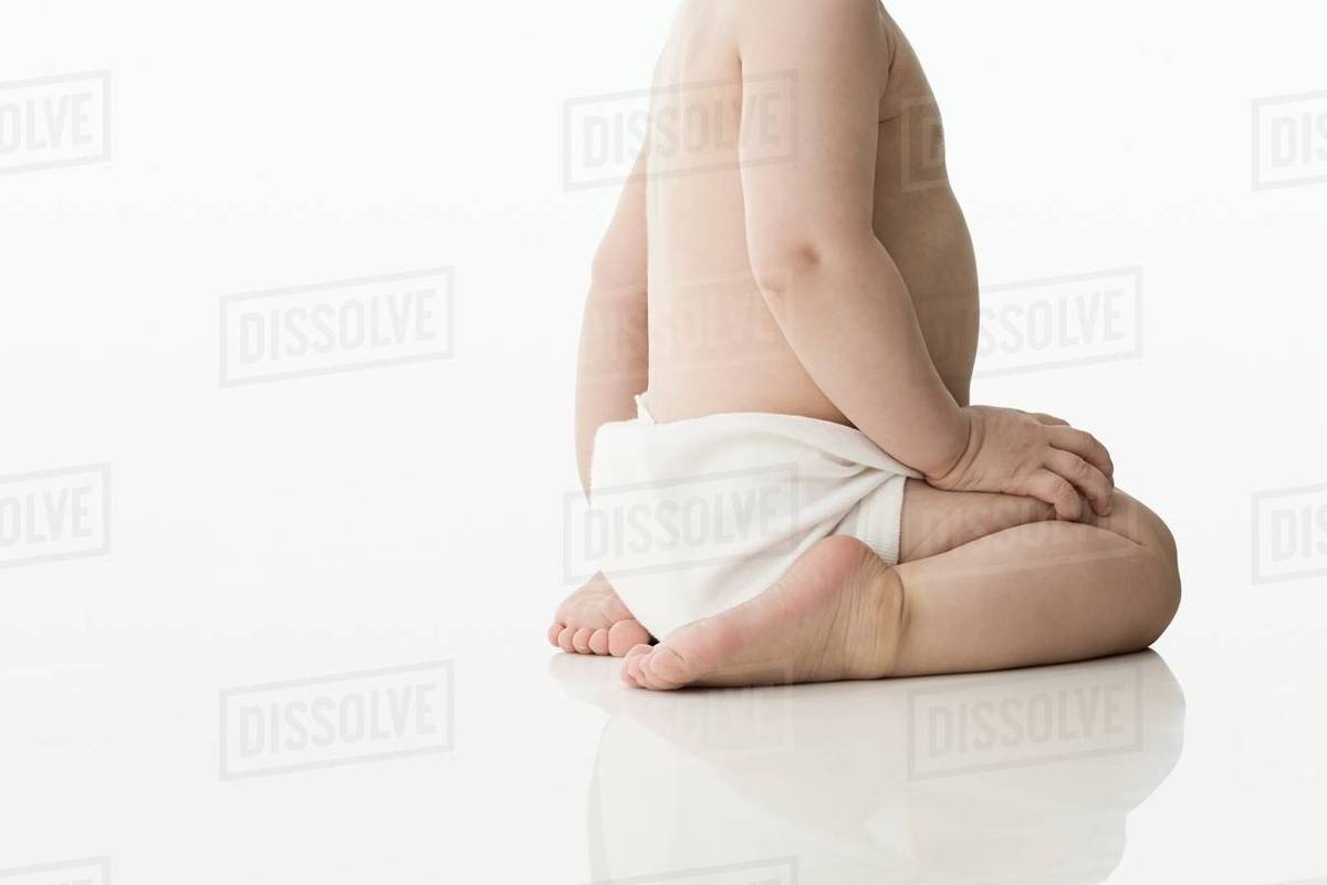 Baby kneeling Stock Photo Dissolve