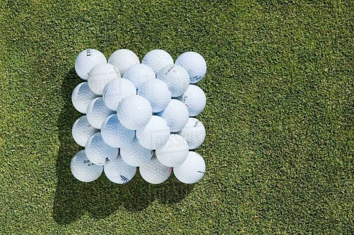 A stack of golf balls Stock Photo Dissolve
