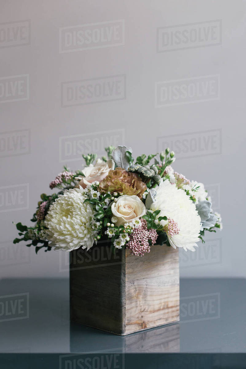 Flower Arrangement In Wooden Box Close Up Stock Photo Dissolve