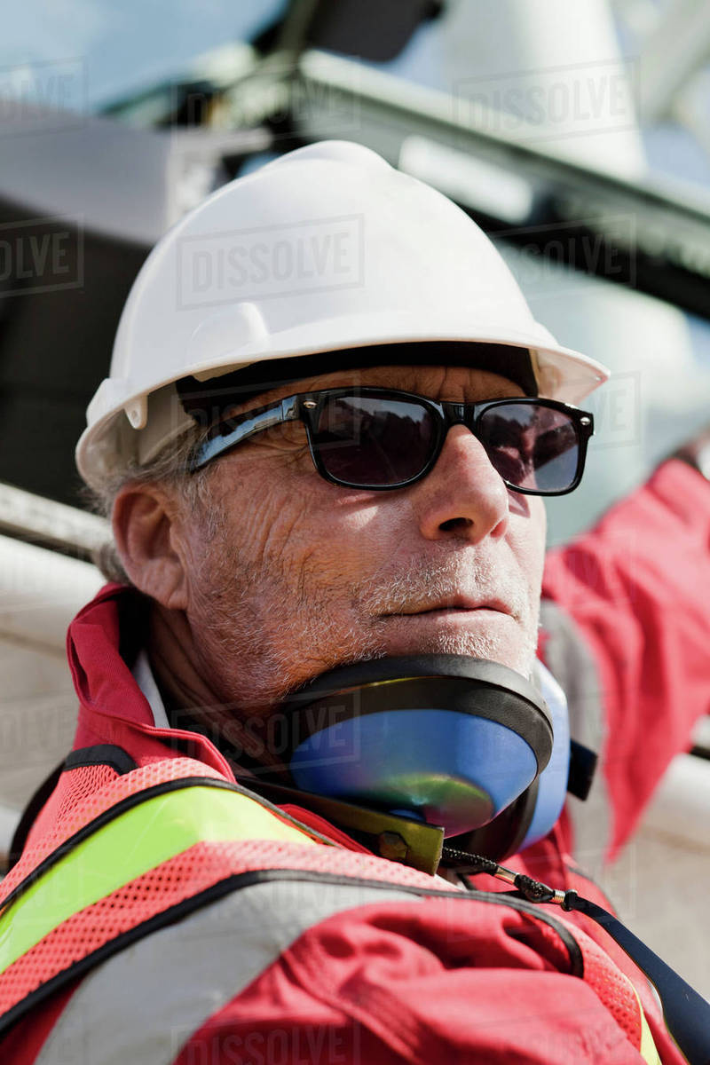 Engineer working on oil rig Stock Photo Dissolve