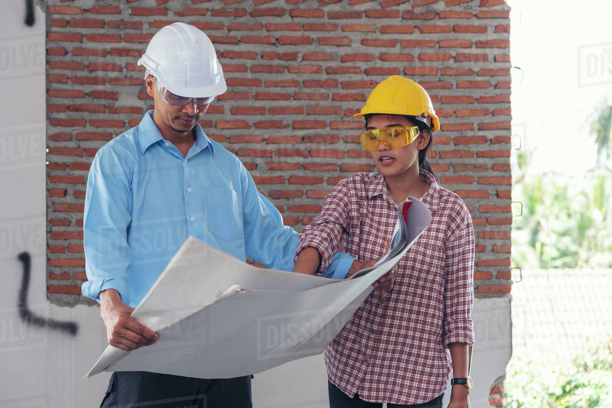 Construction engineer teamwork Safety Suit Trust Team Holding White ...