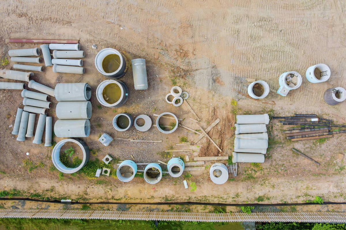 Stacked pipe at concrete drainage pipes for building on a construction