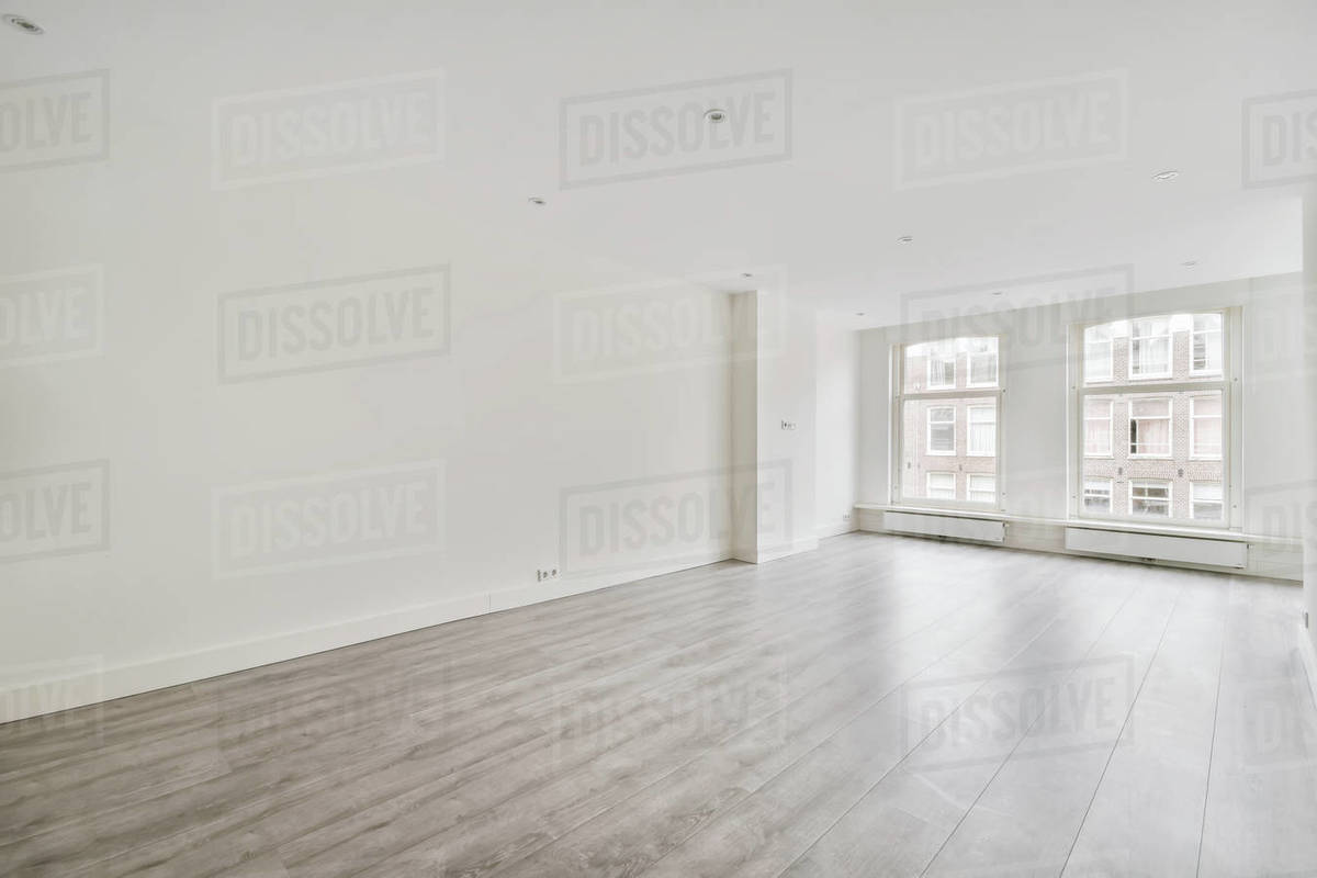 Modern room with wooden floor and white walls Stock Photo Dissolve