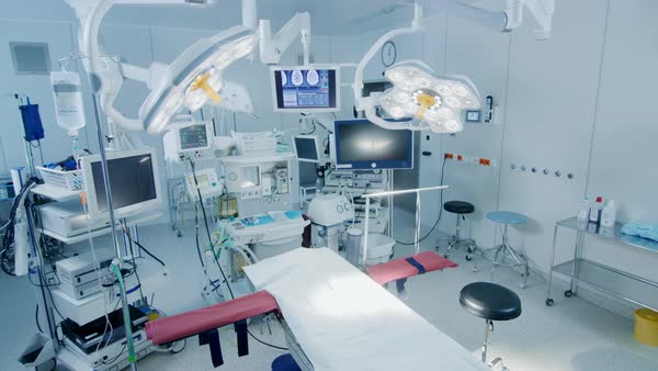 Establishing shot of technologically advanced operating room with no ...