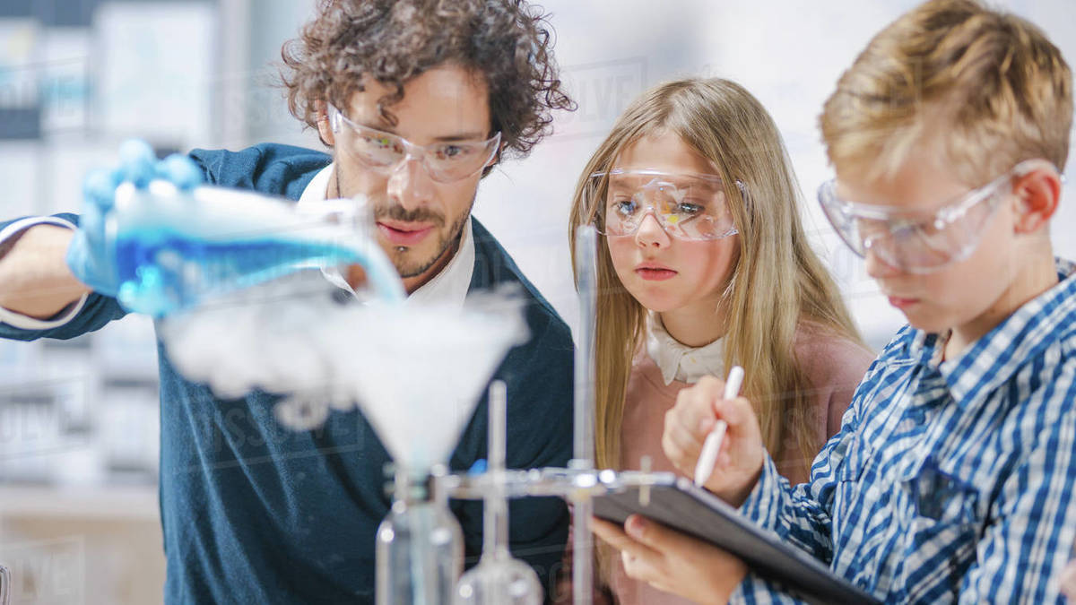 Elementary School Science Classroom Enthusiastic Teacher Explains