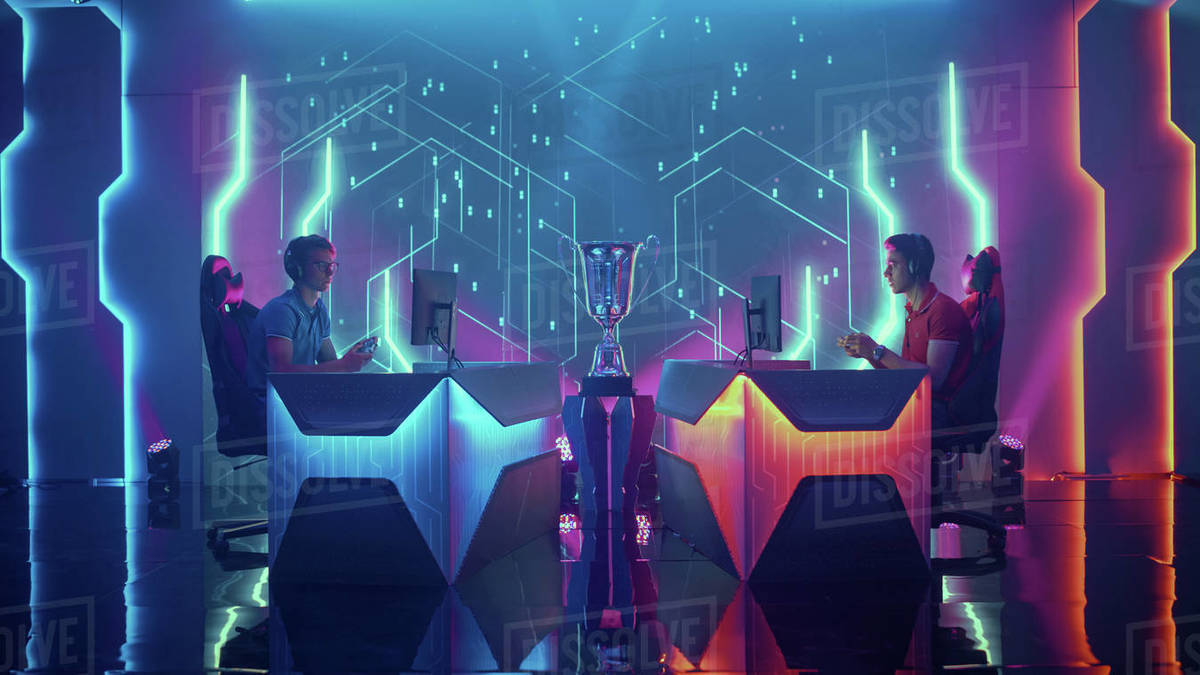 Two Professional Esport Gamers Using Controllers Playing Console Video