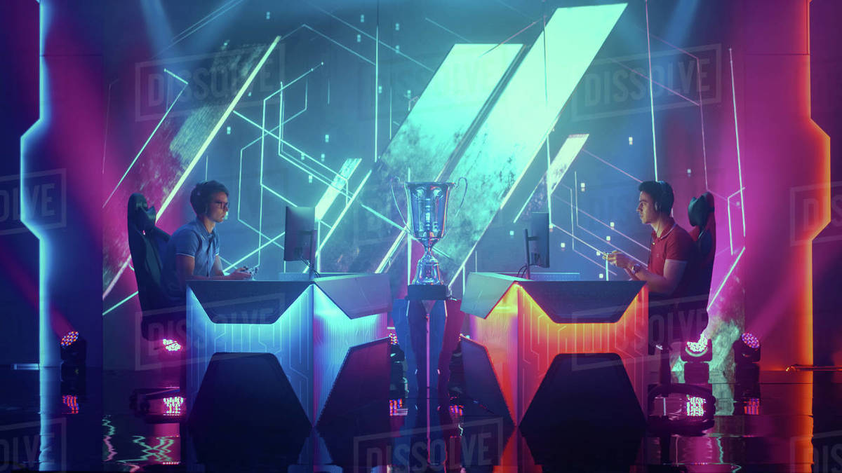 Two Professional Esport Gamers Using Controllers Playing Console Video