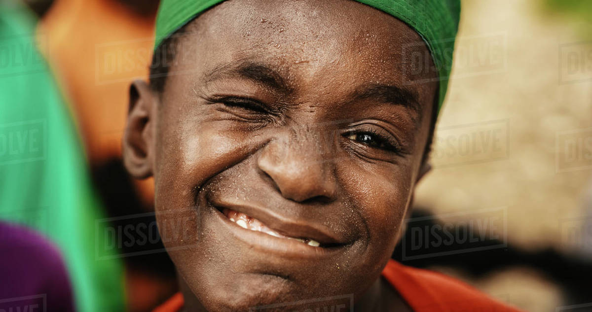 Close Up Portrait of an Expressive Authentic African Kid Smiling