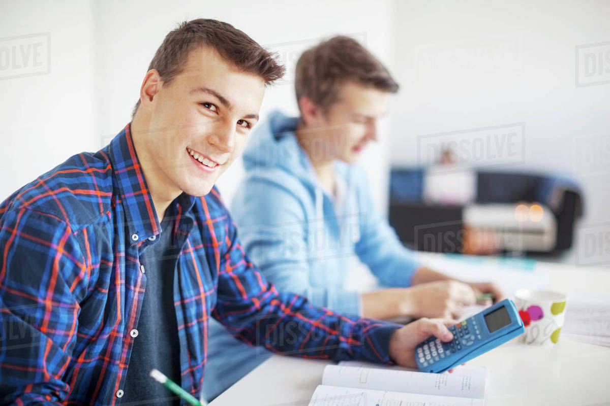 Teenage boys doing homework - Royalty-free Stock Photo | Dissolve