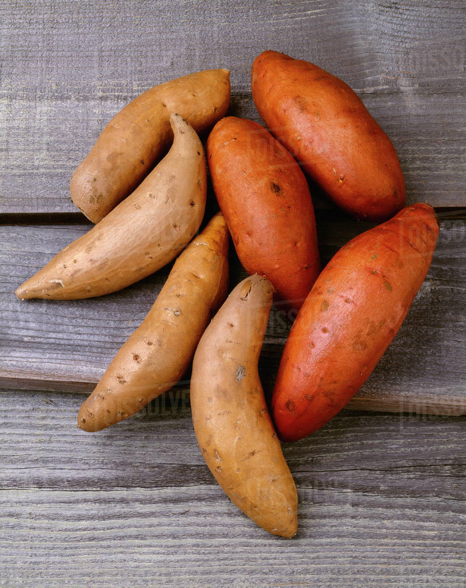 Agriculture Traditional sweet potatoes on the left and yams, a