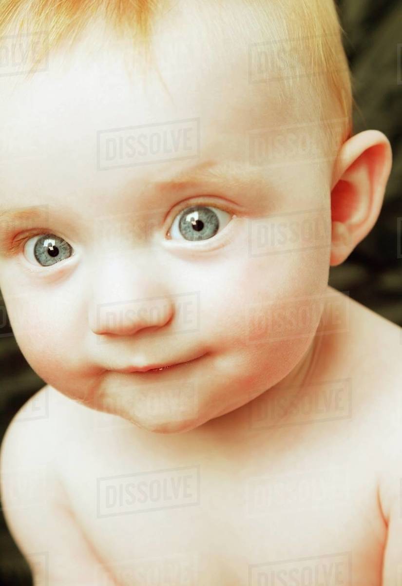 Baby With Wide Eyes Stock Photo Dissolve