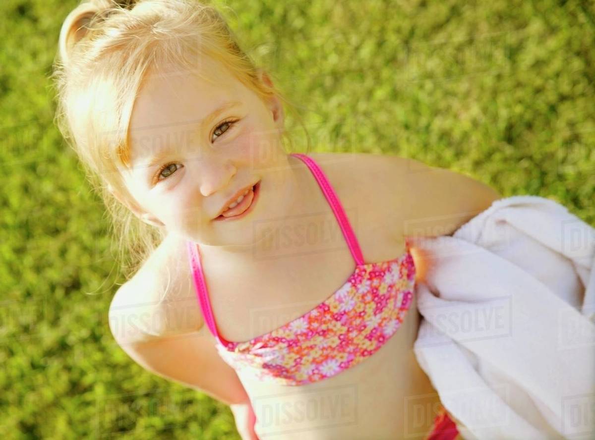 Child With Bathing Suit And Towel Stock Photo Dissolve