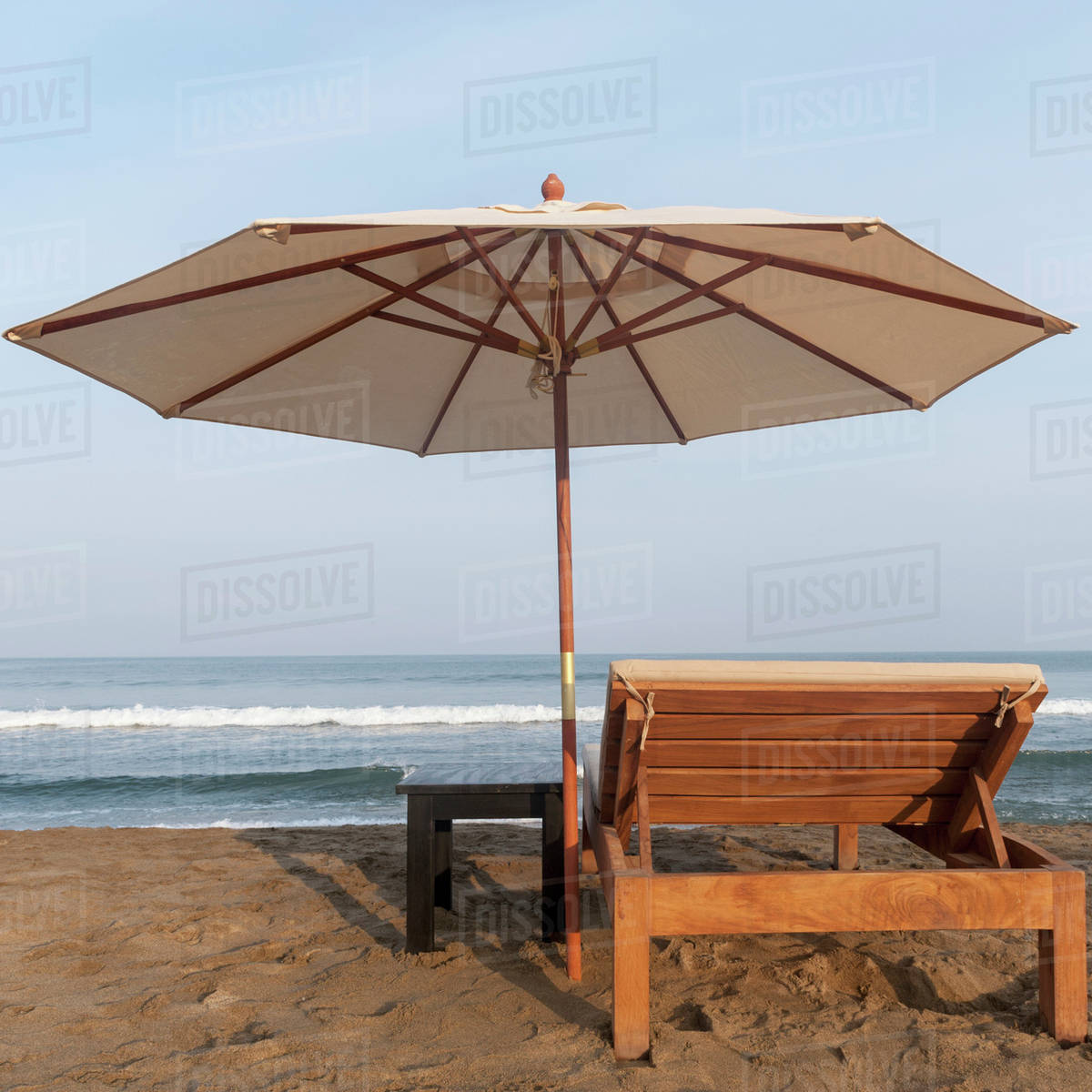 A Lounge Chair And Umbrella On The Beach At The Water's Edge; Sayulita, Mexico Royalty-free stock photo