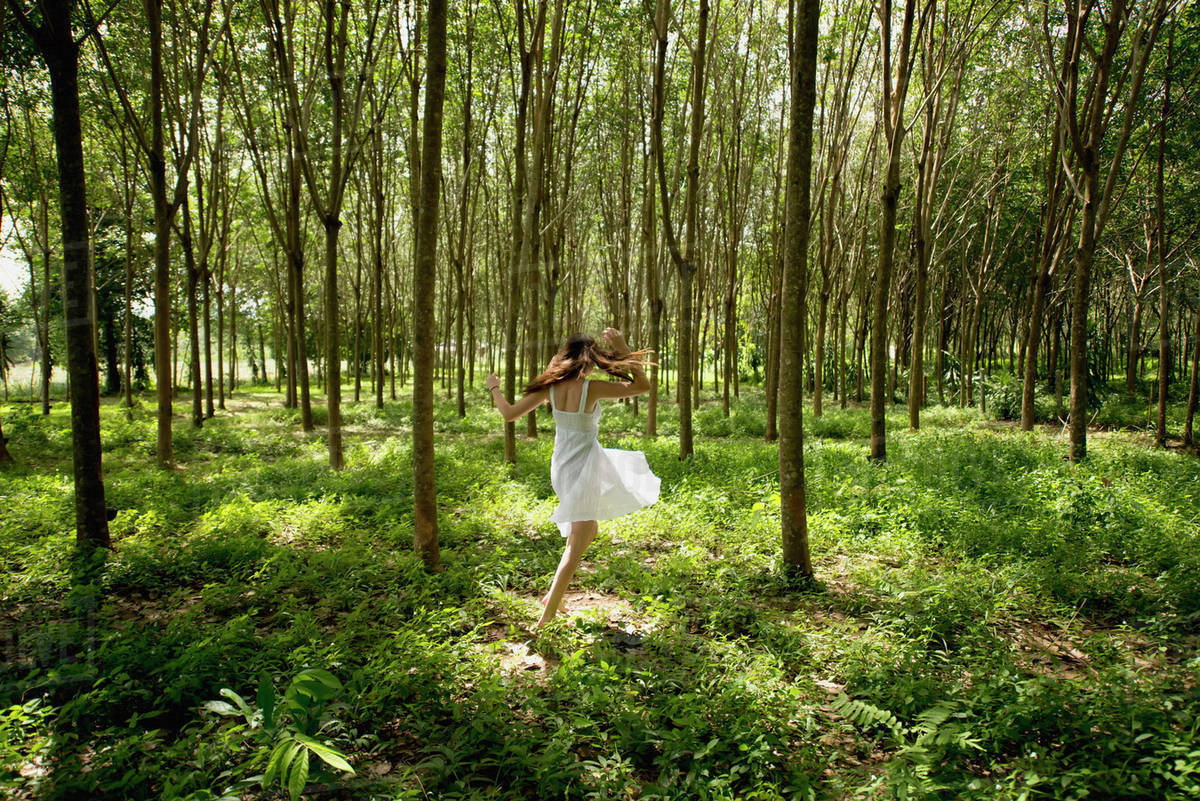 Girl Dancing In The Woods Phuket Thailand Stock Photo Dissolve