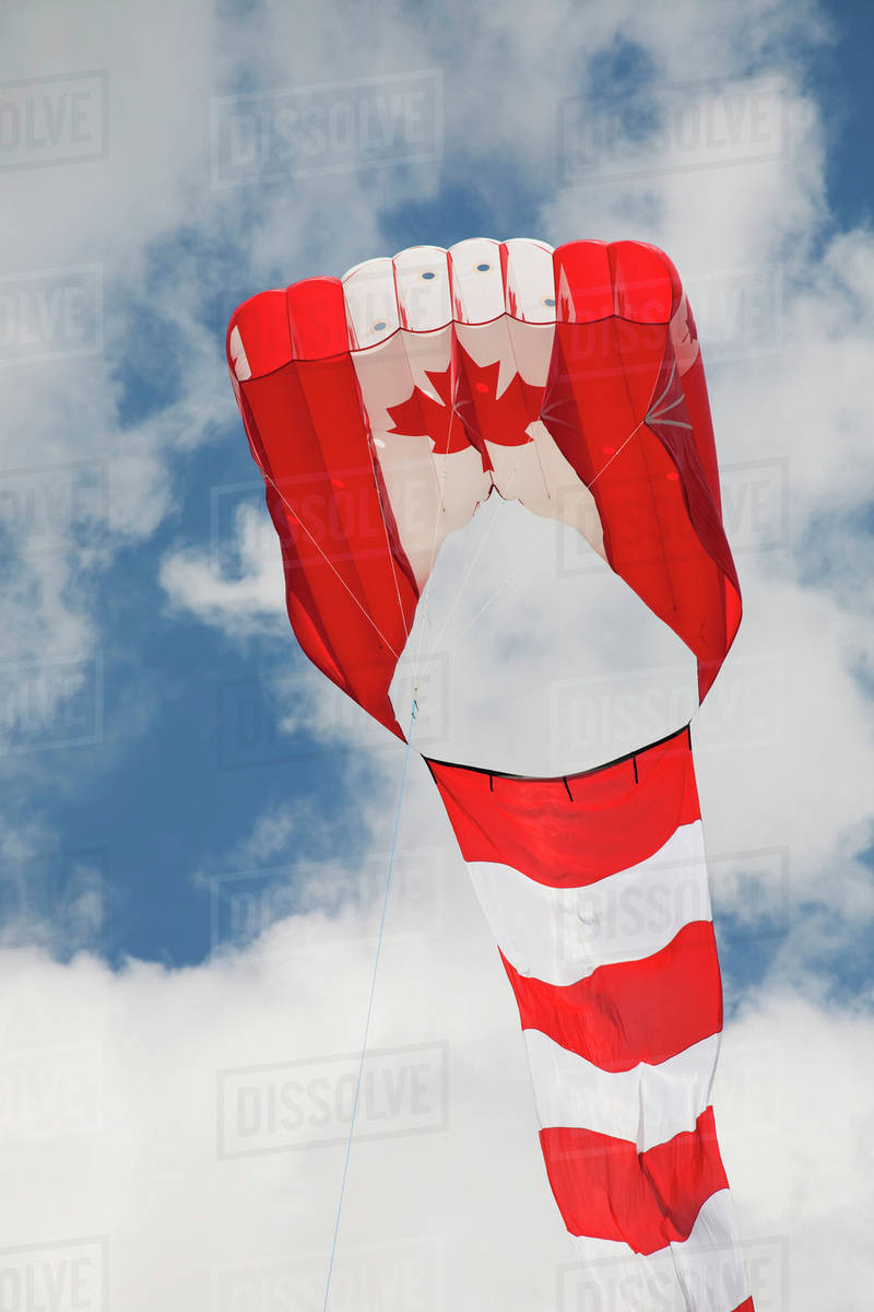 Large Canadian Flag Kite With Blue Sky And Clouds; Port Colborne
