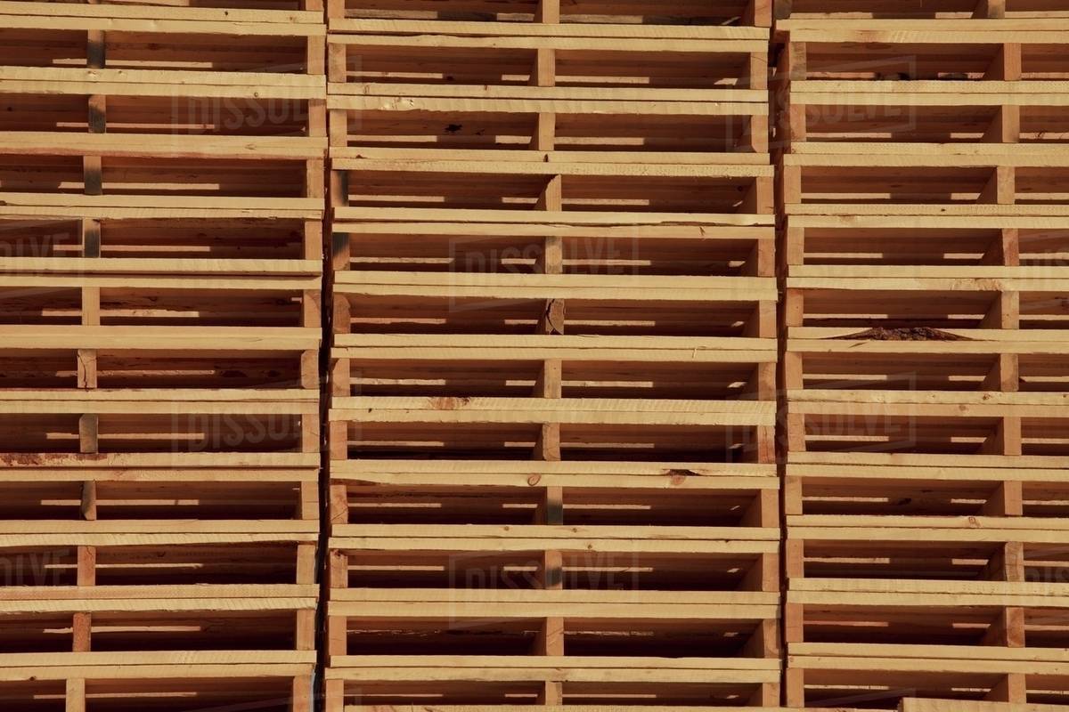 Stacked Wooden Pallets; Edmonton, Alberta, Canada Stock Photo Dissolve