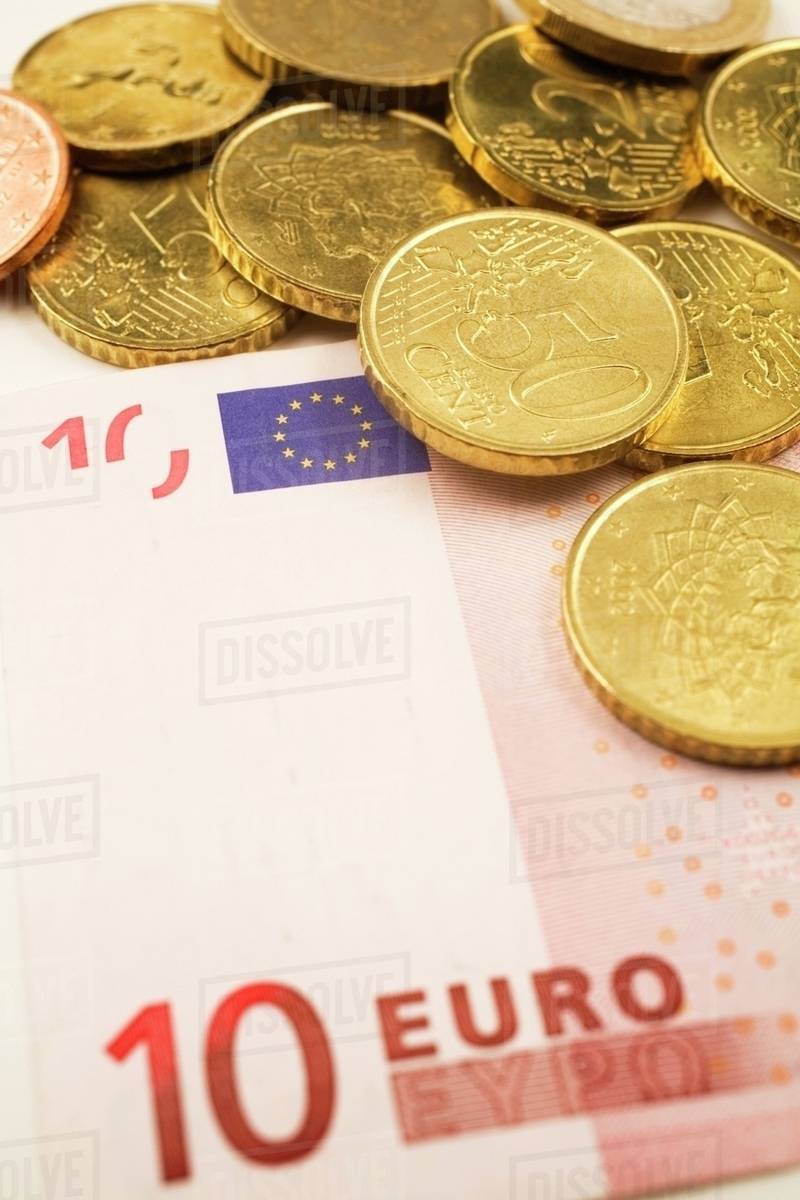 Euro Coins On Top Of A 10 Currency Bank Note Stock Photo Euro Currency Bank Note