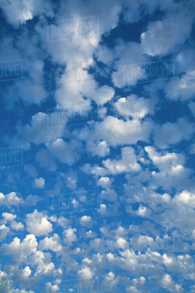 Blue Sky With Scattered Clouds Stock Photo Dissolve