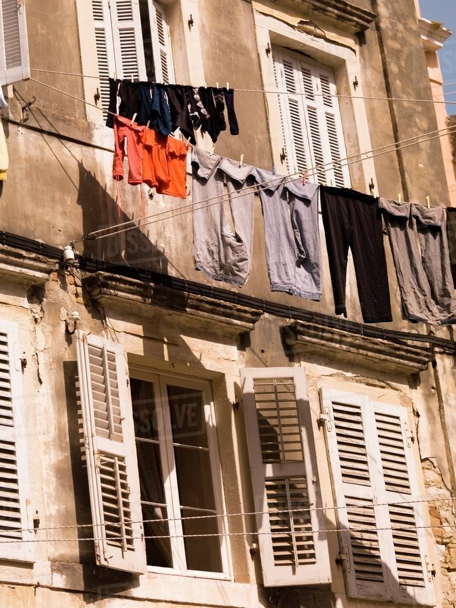 Laundry On The Line, Corfu, Greece Stock Photo Dissolve