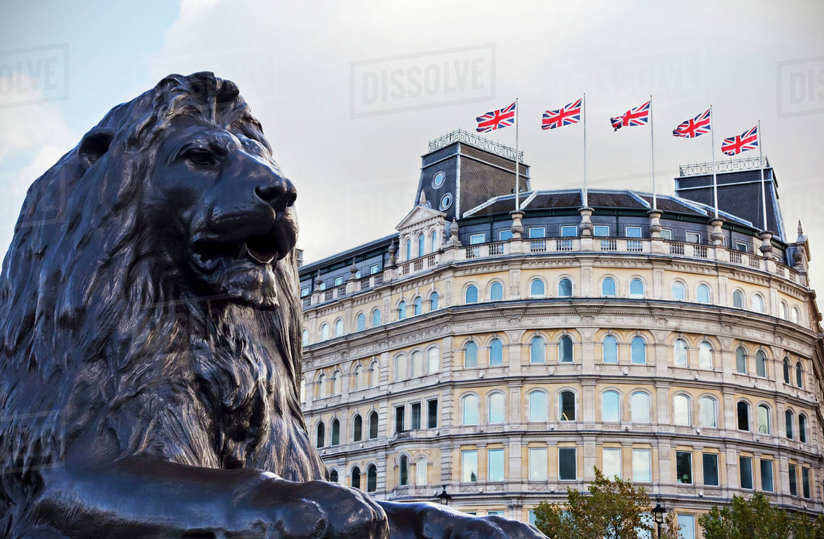 Statue of a lion in Trafalgar Square; London, England Stock Photo