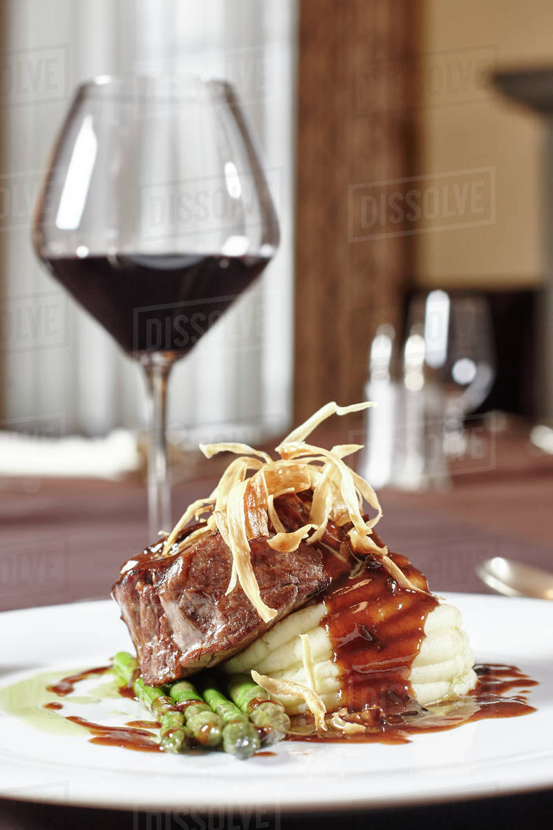 Filet mignon steak dinner with mashed potatoes and gravy