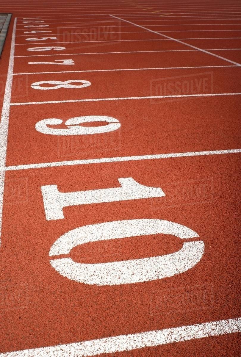 Close up of lane numbers on a track Stock Photo Dissolve