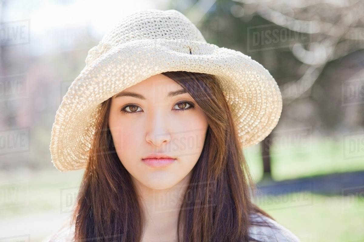 Portrait of a girl wearing a hat Stock Photo Dissolve