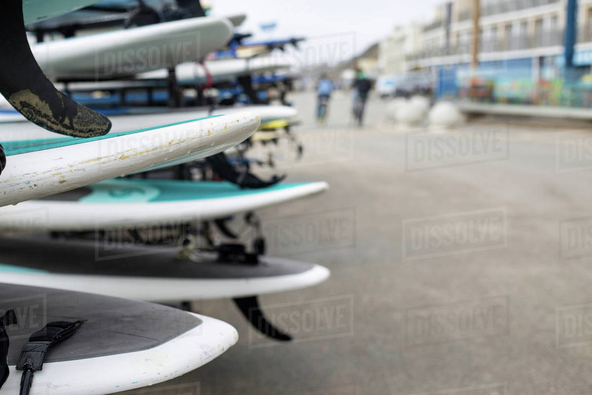 Stack of surfboards, Bournemouth beach, Bournemouth, Dorset, UK Stock