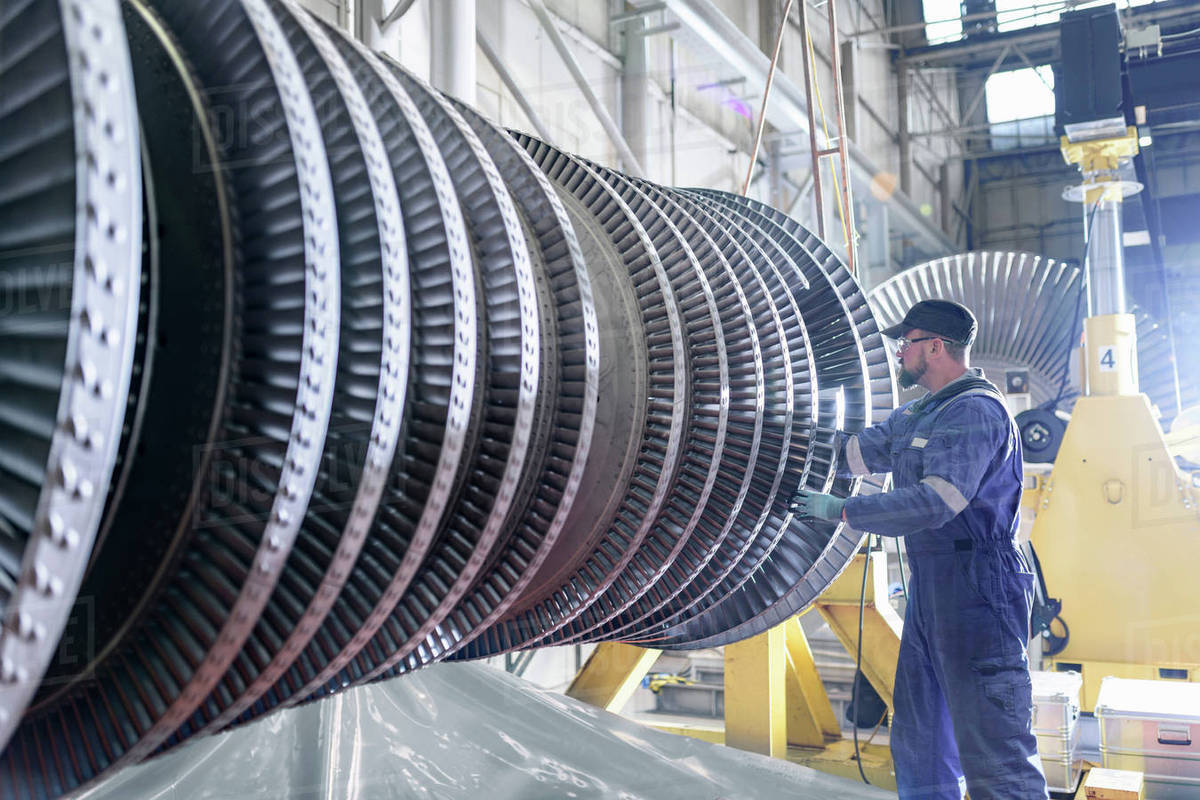 Engineer working on high pressure steam turbine in turbine maintenance