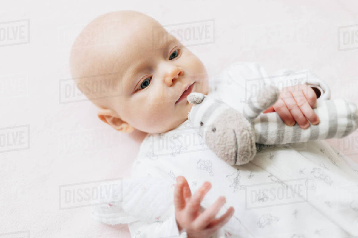 baby holding toy