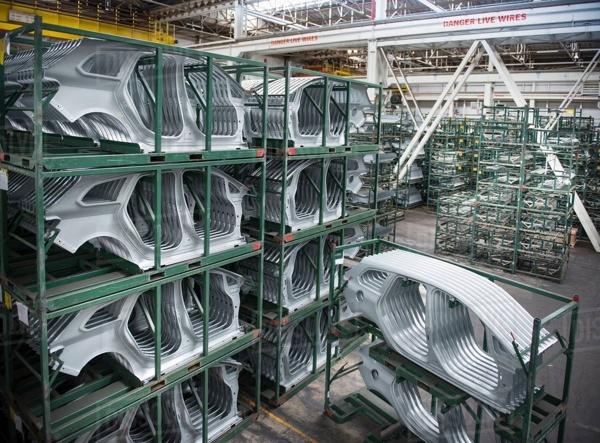 Car body parts in car factory Stock Photo Dissolve