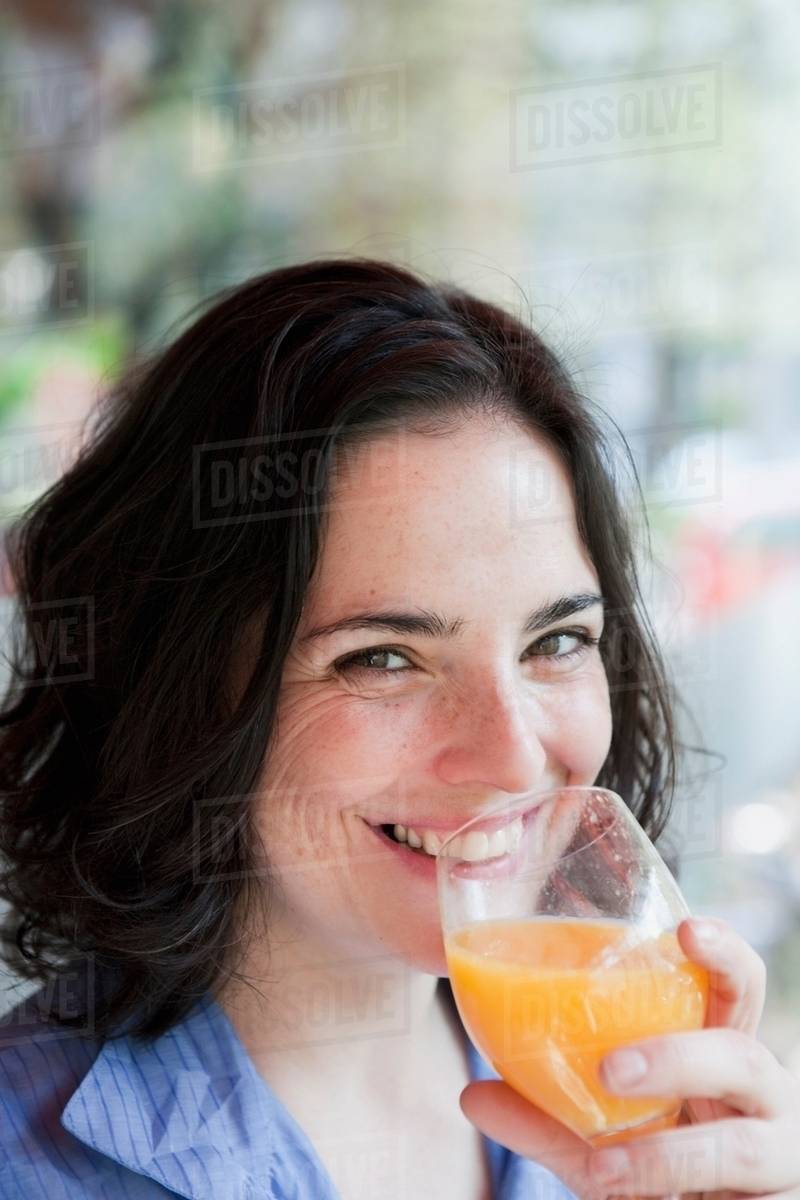 Woman Drinking Juice Stock Photo Dissolve