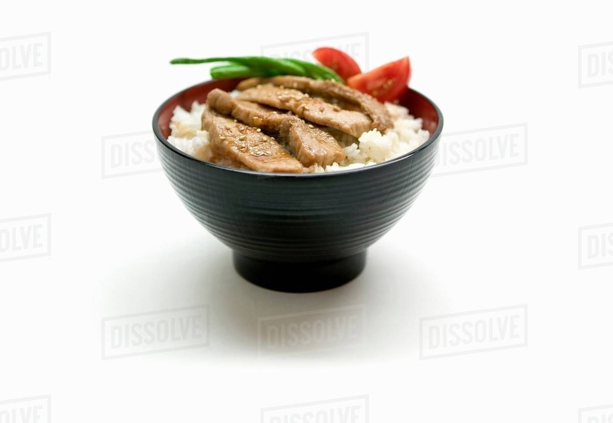 Close up of bowl of Japanese food Stock Photo Dissolve